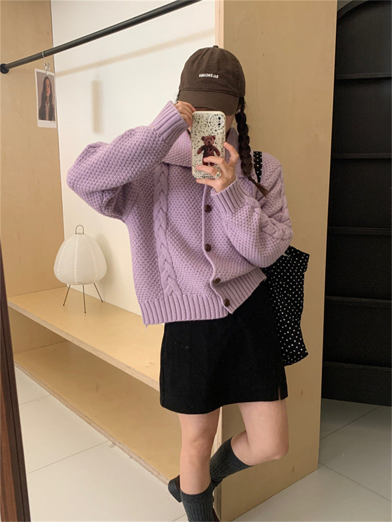Women's oversized knitted jacket with cable design and chic texture and style