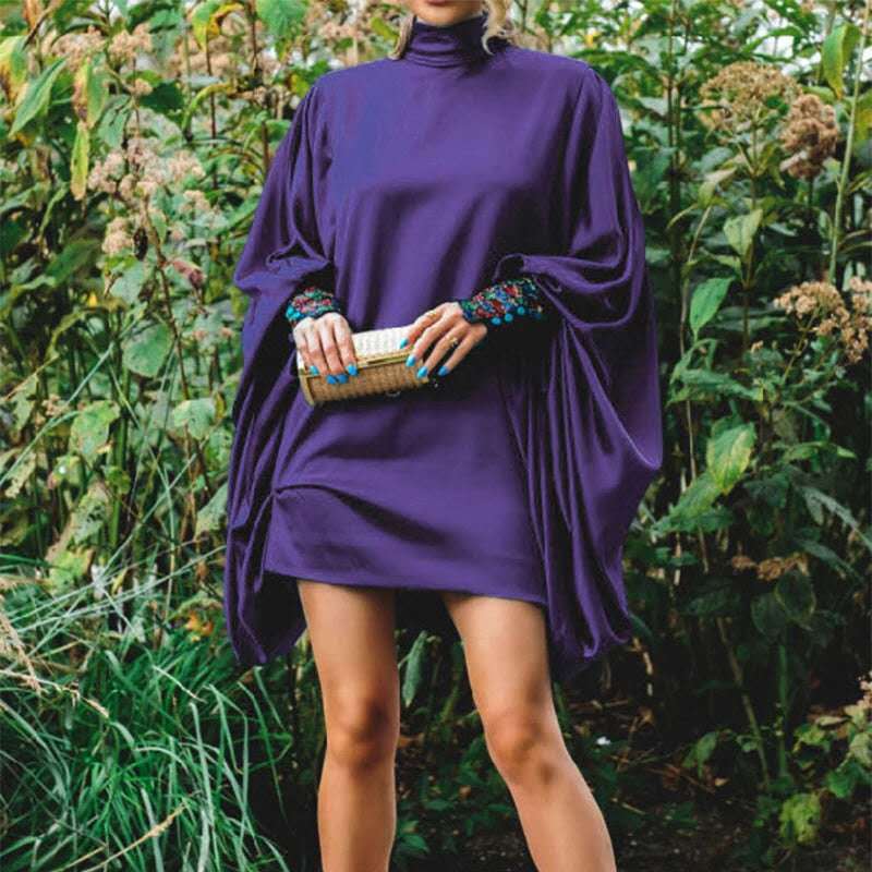 Oversized mini dress for women with voluminous sleeves and an elegant high collar Lune London