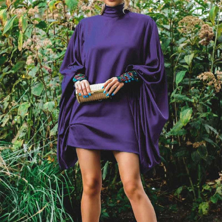 Oversized mini dress for women with voluminous sleeves and an elegant high collar Lune London