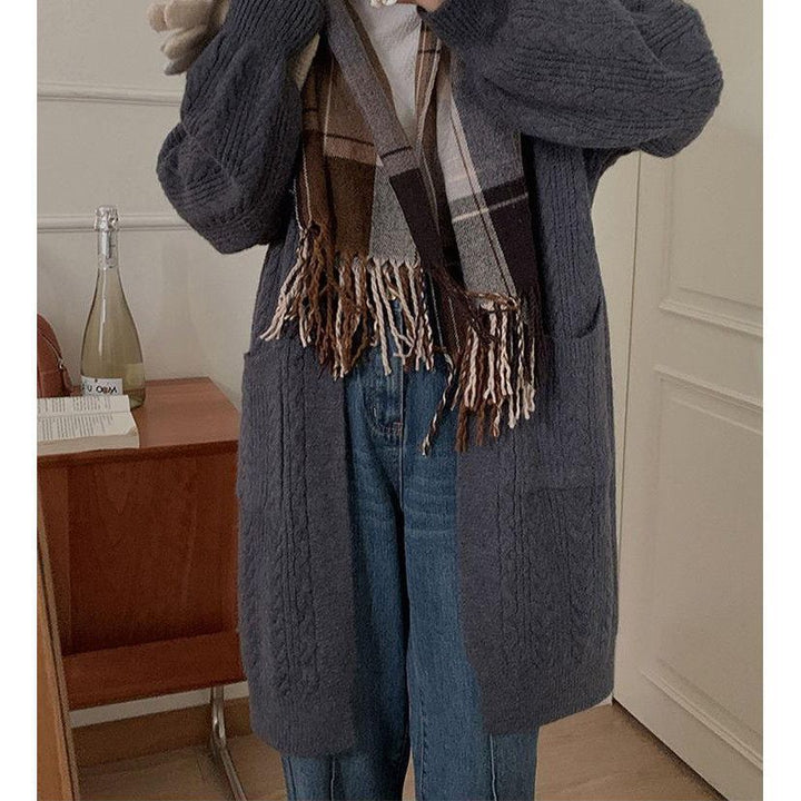 Ladies Thick Knit Cardigan with deep pockets and elegant Braid design Lune London