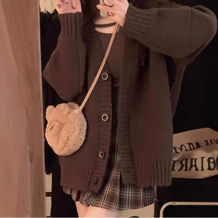 Ladies chunky knit cardigan with voluminous sleeves and buttoned neckline Lune London