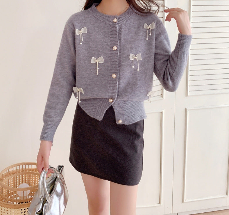 Knitted jacket for women with lace embellishments and button details Lune London