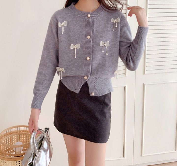Knitted jacket for women with lace embellishments and button details Lune London