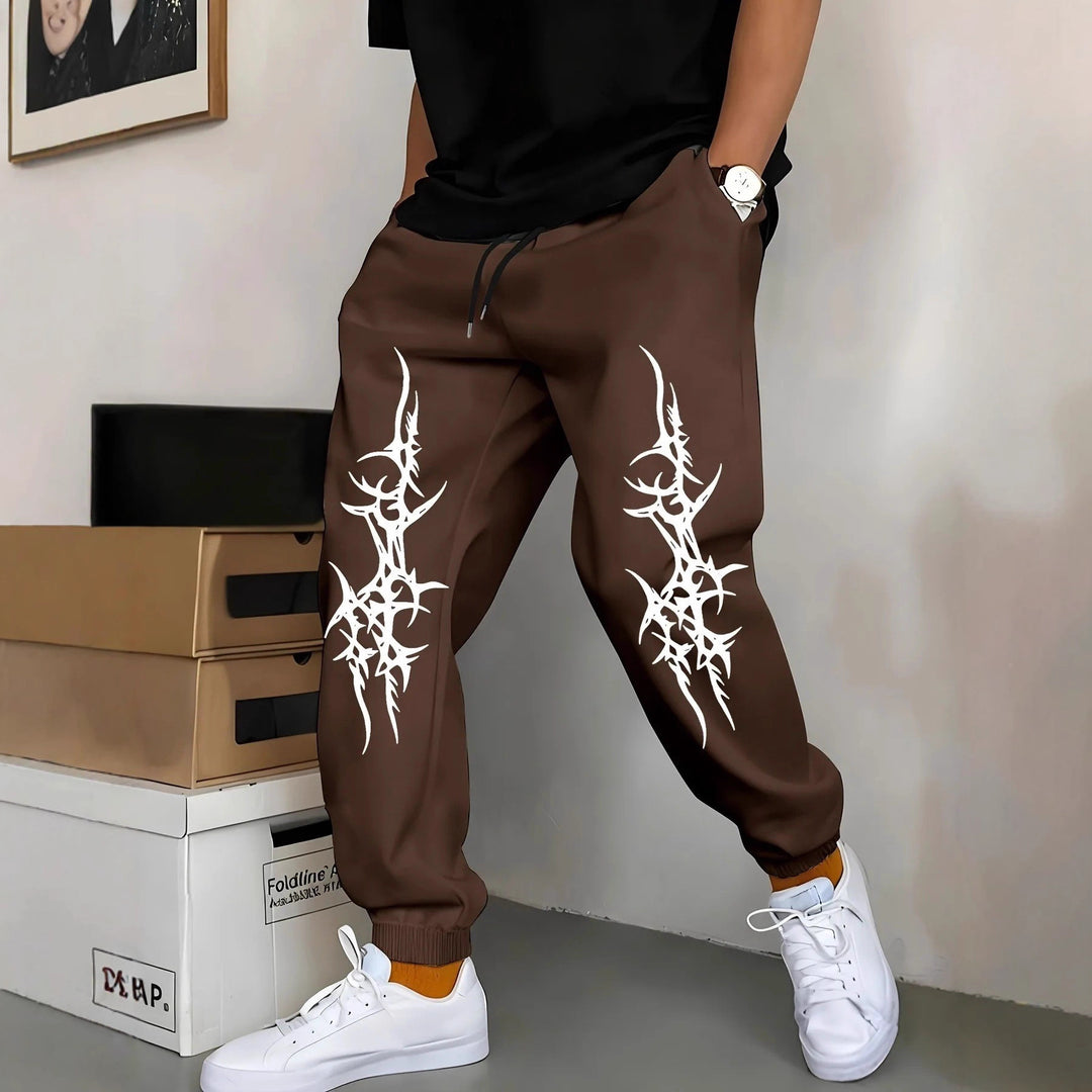 Men's Relaxed Fit Jogging Pants with Eye-Catching Graphic Design Chic & Stil