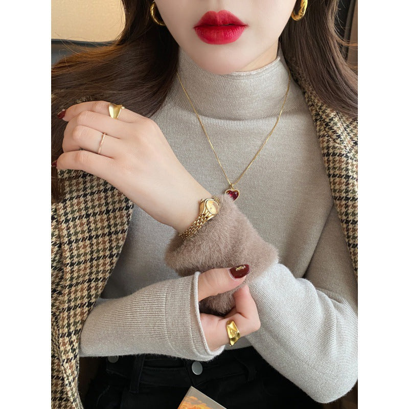 Pull élégant à col roulé pour femmes en matériau doux Chic & Stil