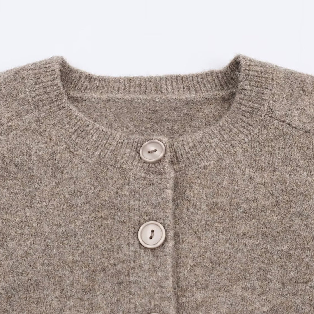 Short knitted jacket for women with button closure Lune London