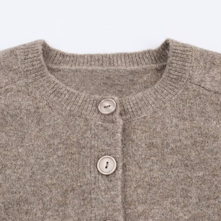 Short knitted jacket for women with button closure Lune London