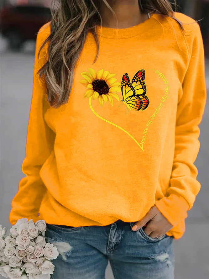 Sweatshirt pour femmes avec motif graphique de papillon et de tournesol Chic & Stil
