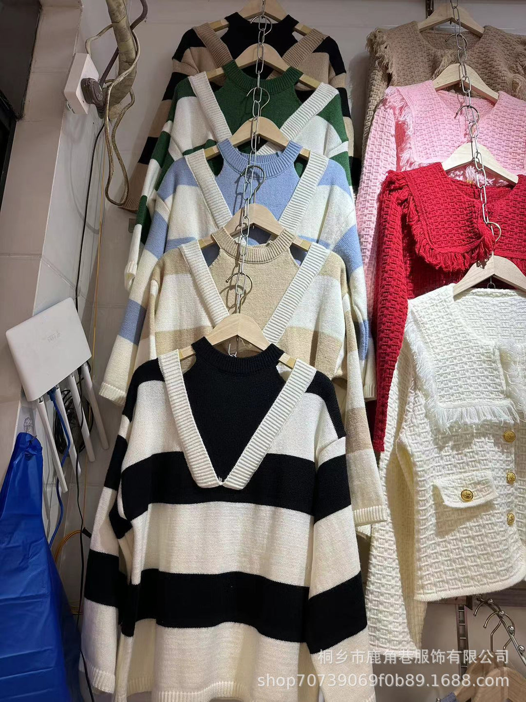 Ladies Oversized V-neck Pullover with trendy striped pattern and open shoulder design Lune London