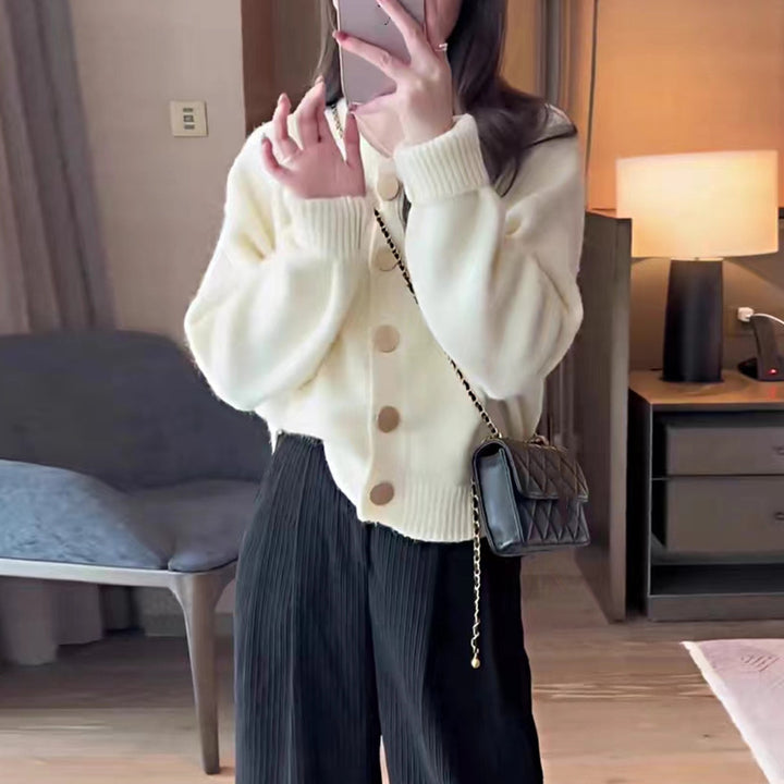 Women’s knit jacket with gold button closure and loose fit Lune London