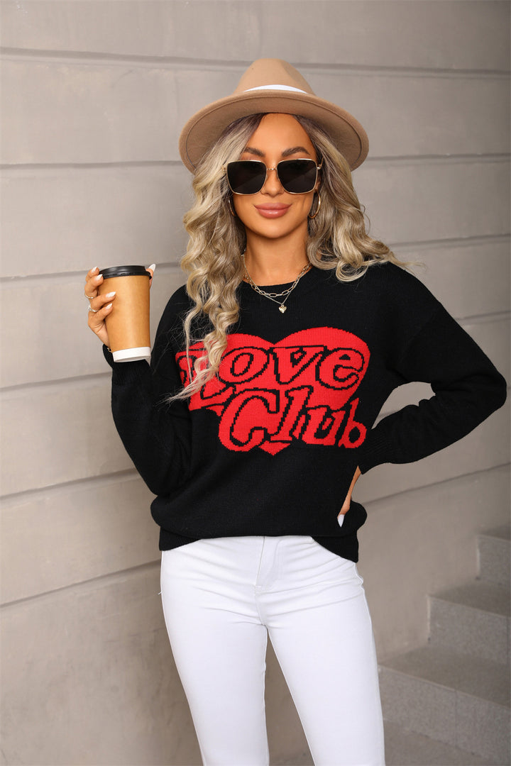 Pull pour femmes avec une inscription frappante et une coupe généreuse Chic & Stil