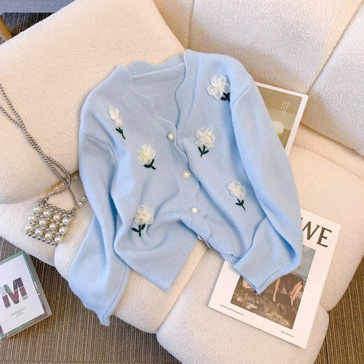 Playful women's cardigan button with floral embroidery and pearl buttons Lune London