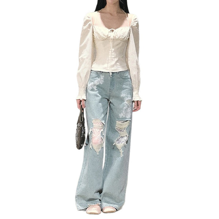 Women's wide cut jeans with individual destroyed details and floral print Lune London