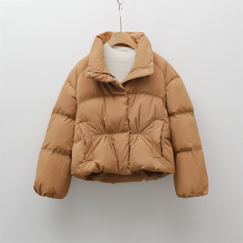 Short quilted jacket with high collar for women with practical pockets Lune London