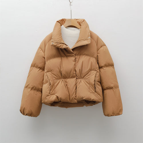 Short quilted jacket with high collar for women with practical pockets Lune London