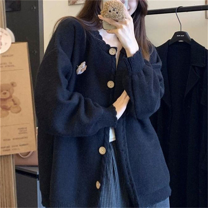 Knit jacket for women with refined cable details and button closure Lune London