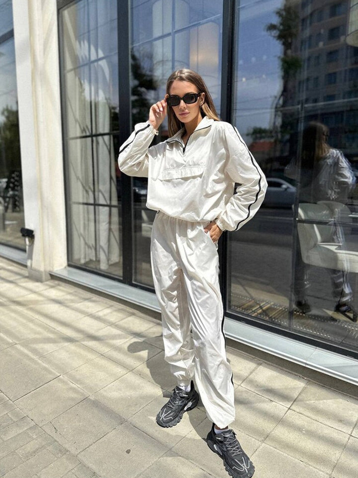 Ladies functional sports suit with high collar and elastic cuffs Lune London