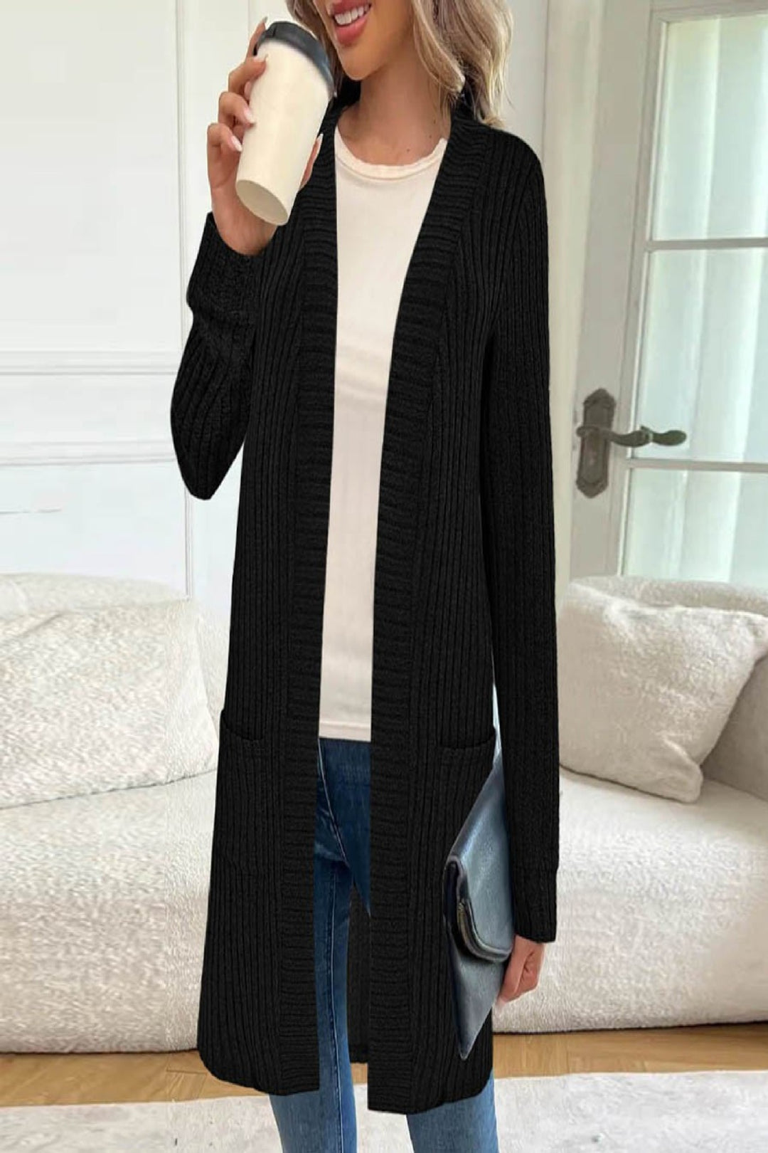 Long knitted jacket for women with side pockets and textured design Lune London