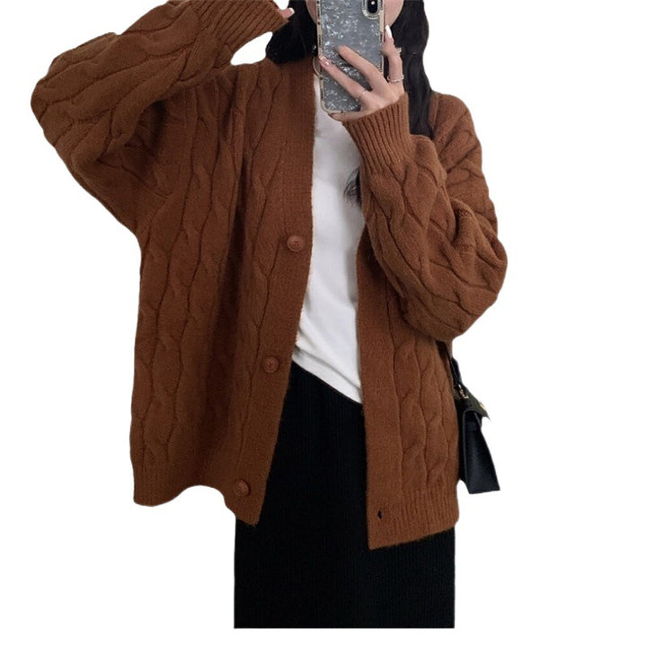 Ladies large knit cardigan with an elegant cable pattern and comfortable button details Lune London