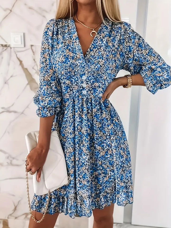 Ladies Mini dress playful and elegant with deep V-neckline and ruffle details Lune London