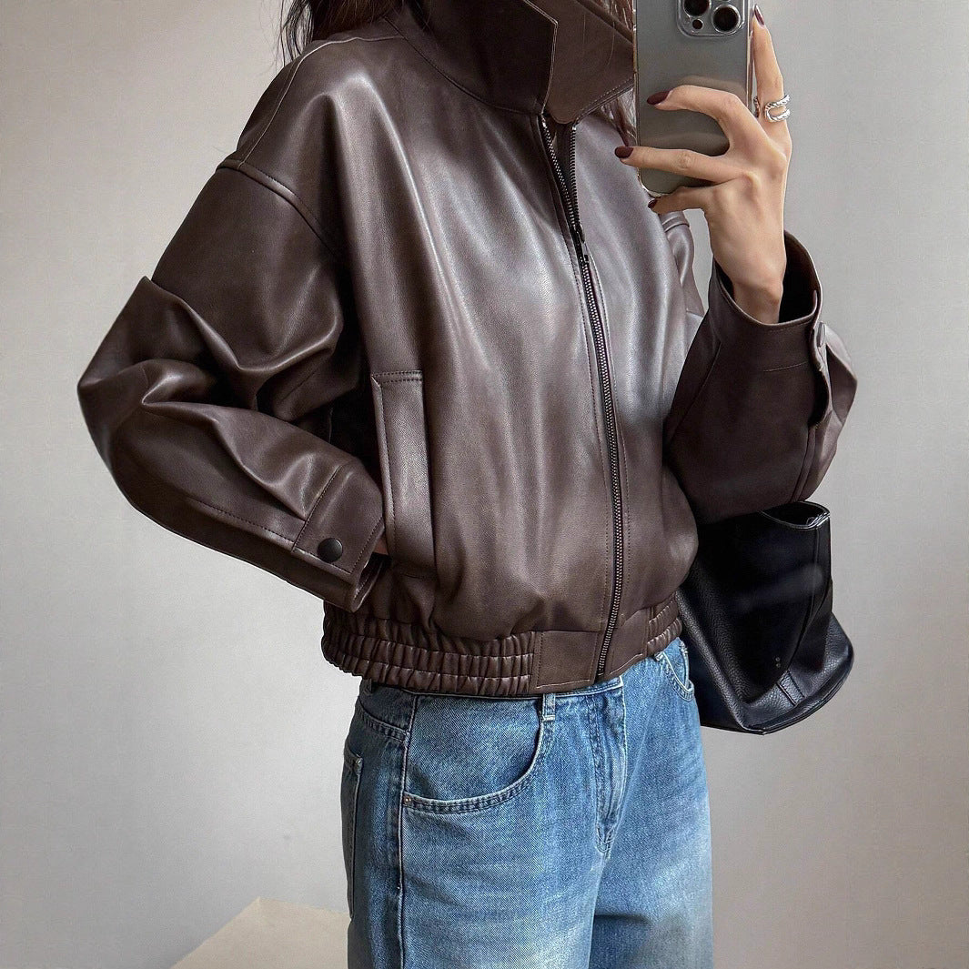 Trendy short coat for women in soft faux leather with elastic straps Lune London