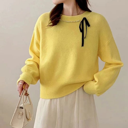 Ladies' fashion sweater with decorative band and pearl details Lune London