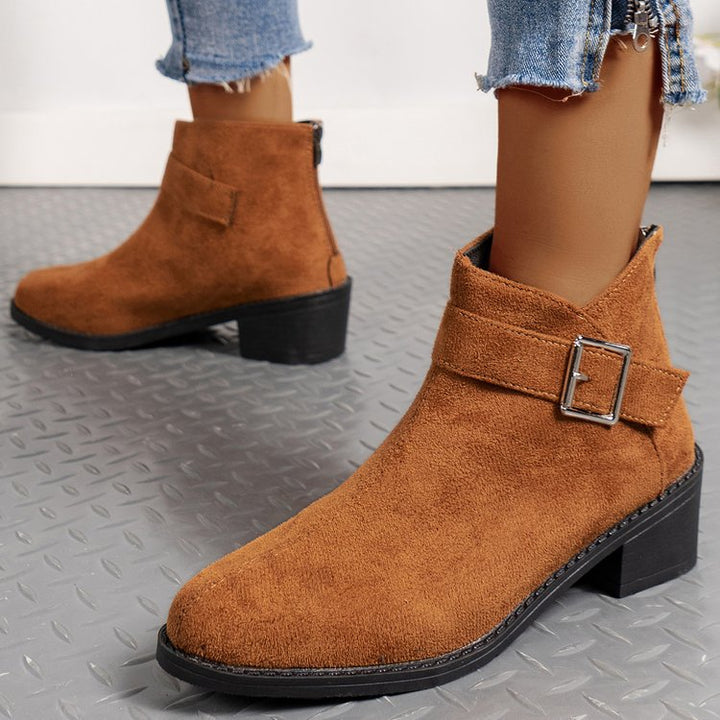 Women's ankle boots with a fashionable buckle detail and a comfortable square heel Lune London