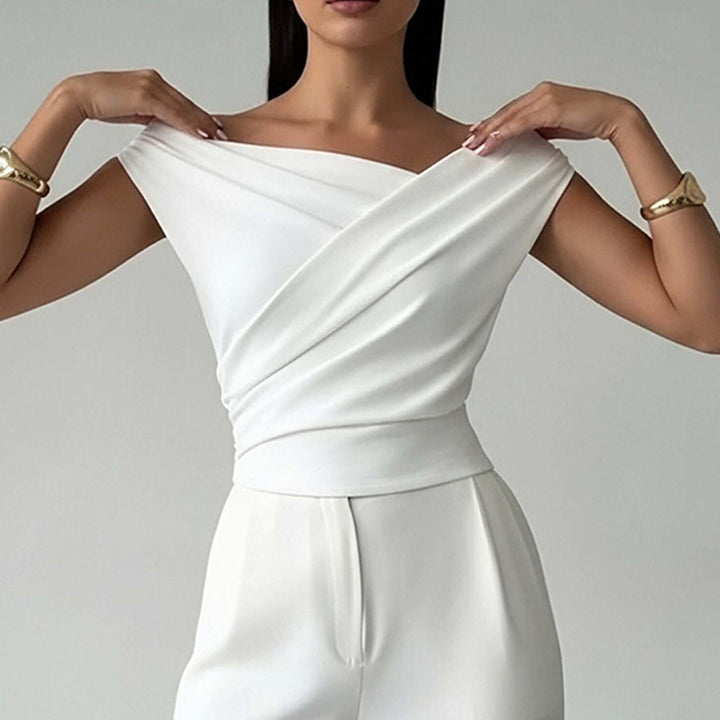 Haut Élégant Femme avec Look Enveloppé et Accent sur la Découpe Chic & Stil