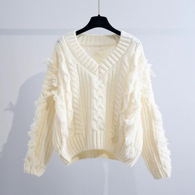 Ladies Stylish knitted sweater with fringes and cable pattern Lune London