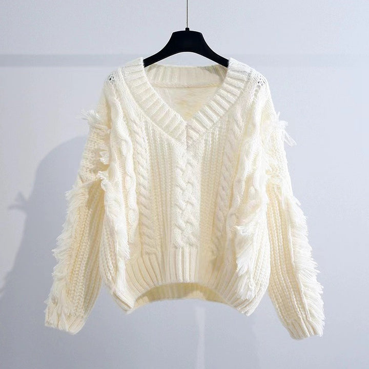 Ladies Stylish knitted sweater with fringes and cable pattern Lune London