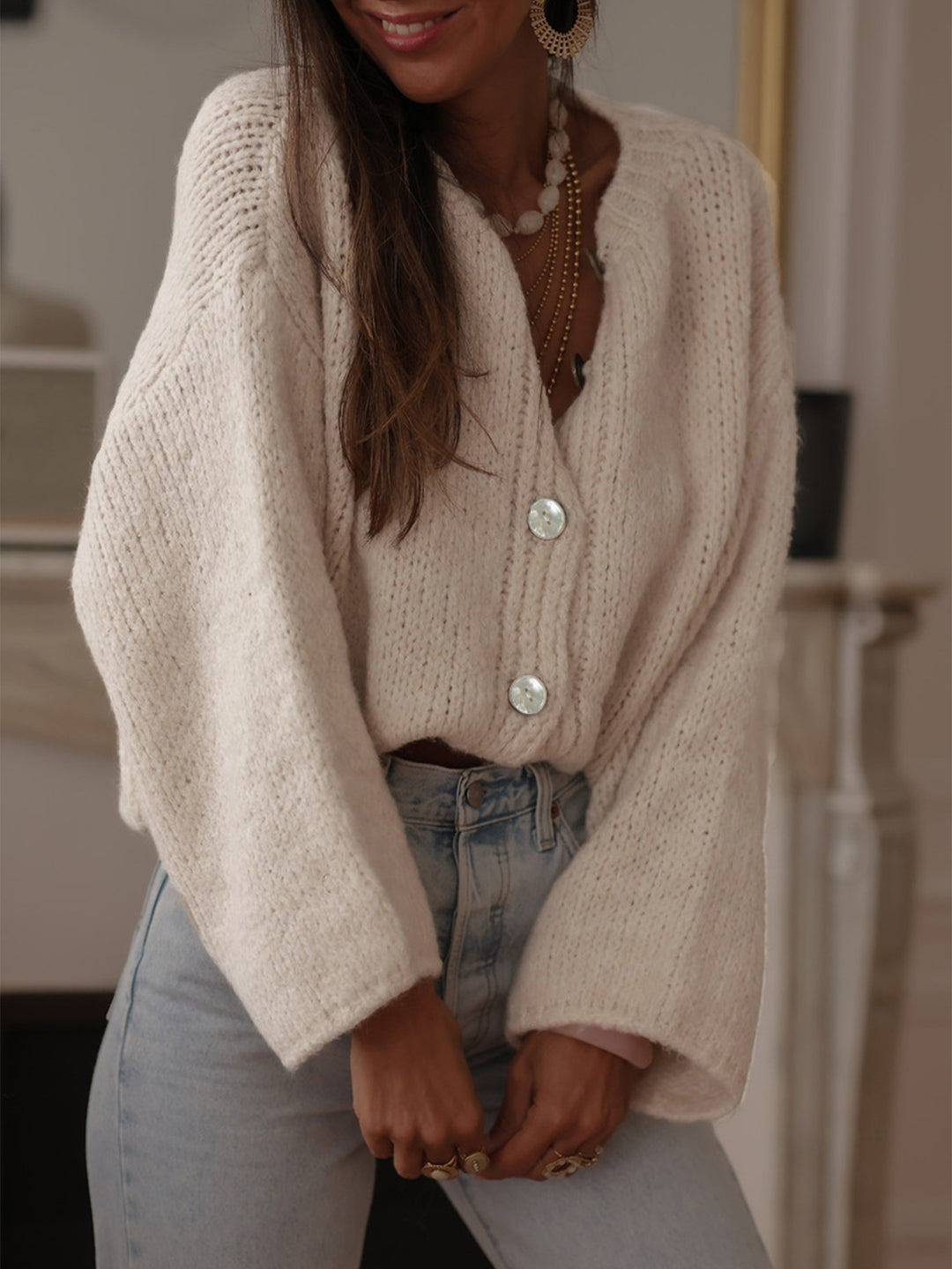 Ladies comfortable pullover with oversized sleeves and elegant pearl buttons Lune London