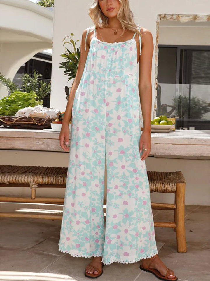 Ladies lightweight jumpsuit with spaghetti straps and ruffled hem Lune London