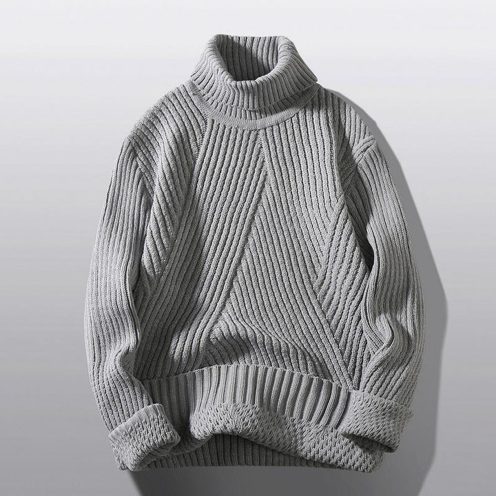Chunky knit turtleneck sweater for women with an elaborate textured pattern Lune London