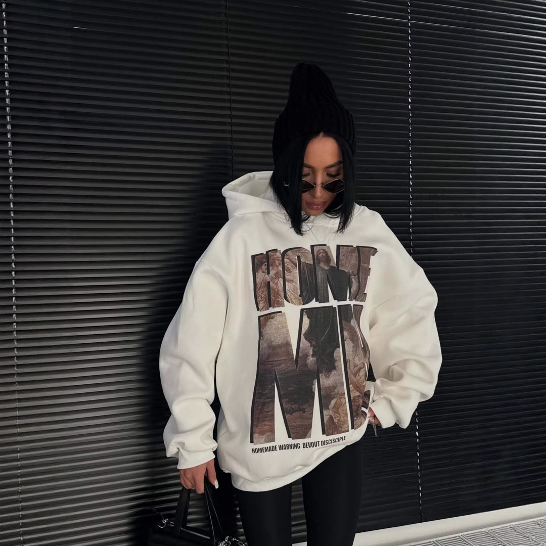 Dames sweat à capuche oversize avec impression graphique accrocheuse Chic & Stil
