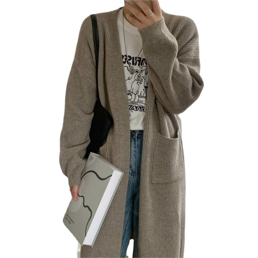 Manteau tricoté pour femmes avec ouvertures et poches spacieuses Chic & Stil