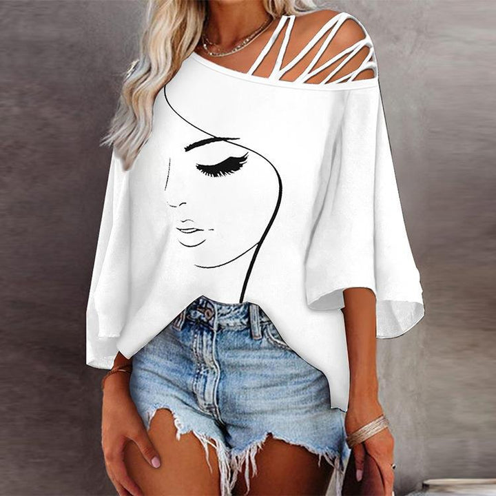 Women's tunic with asymmetric strap design and stylized face graphic Lune London