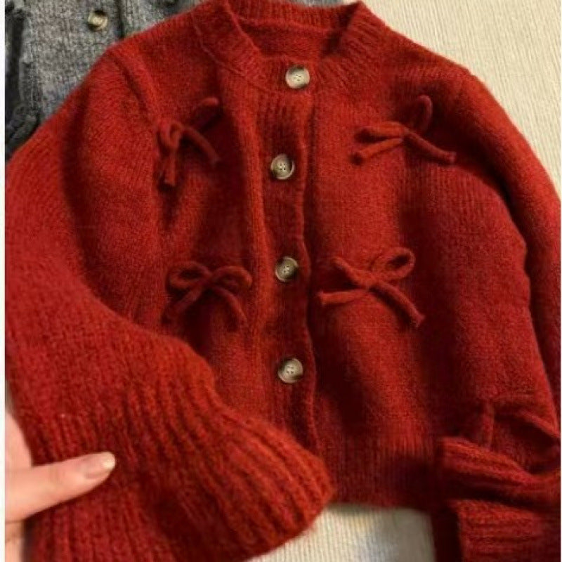 Cardigan pour femmes avec des nœuds décoratifs dessus