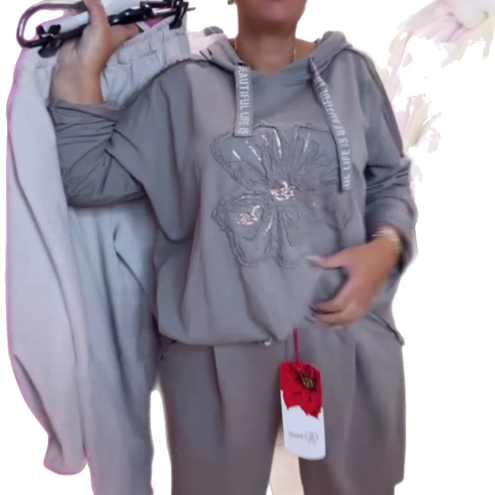 Haut de survêtement décontracté pour femmes avec un motif floral délicat et une broderie de haute qualité Chic & Stil