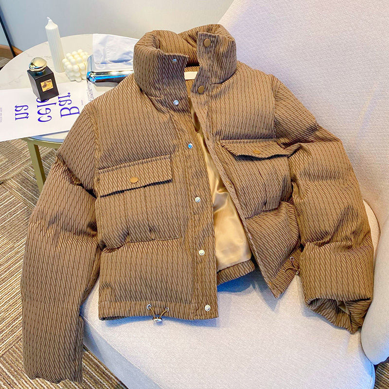 Ladies fashionable down jacket with structured design and practical pockets Lune London