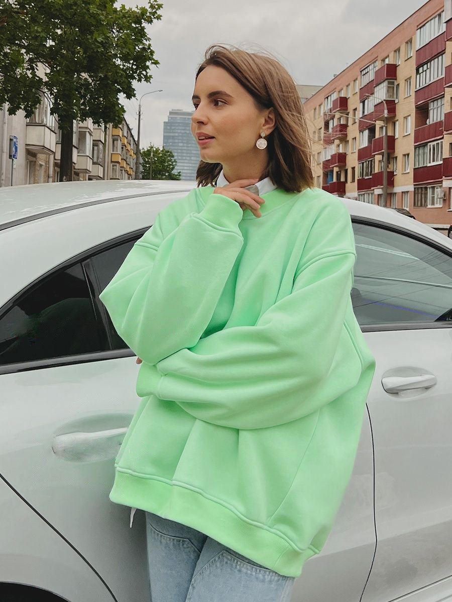 Woman Oversized sweatshirt with a relaxed fit and modern chic accents and style