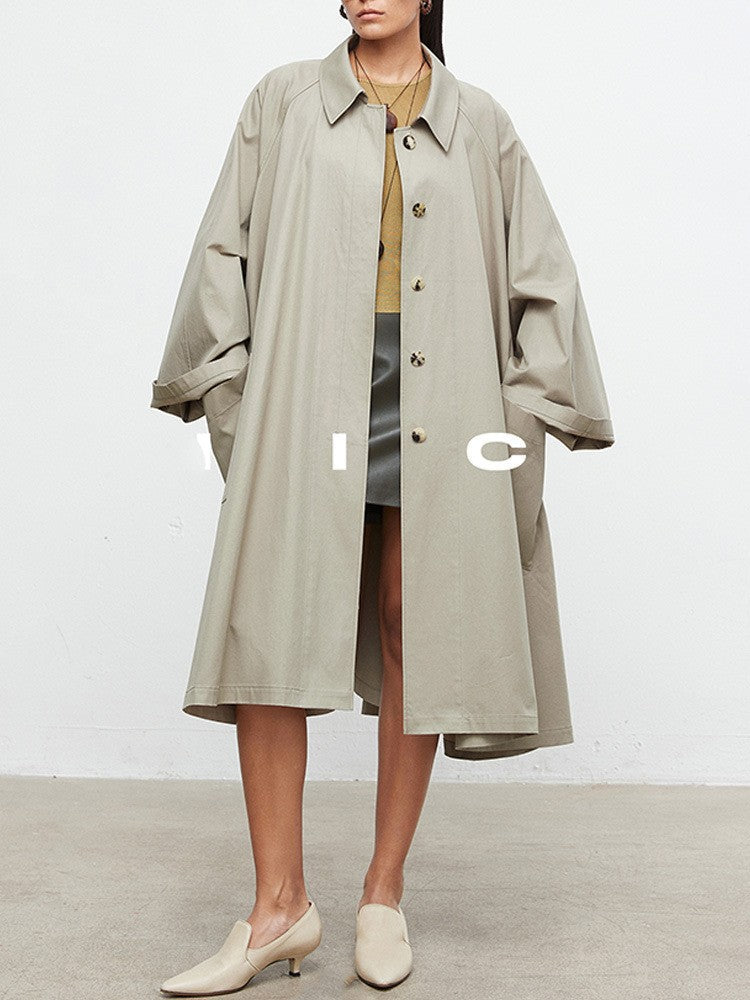 Manteau de trench décontracté pour femmes avec des manches surdimensionnées et des détails de boutons Chic & Stil