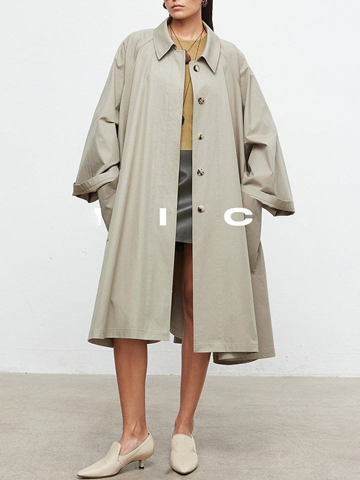 Manteau de trench décontracté pour femmes avec des manches surdimensionnées et des détails de boutons Chic & Stil