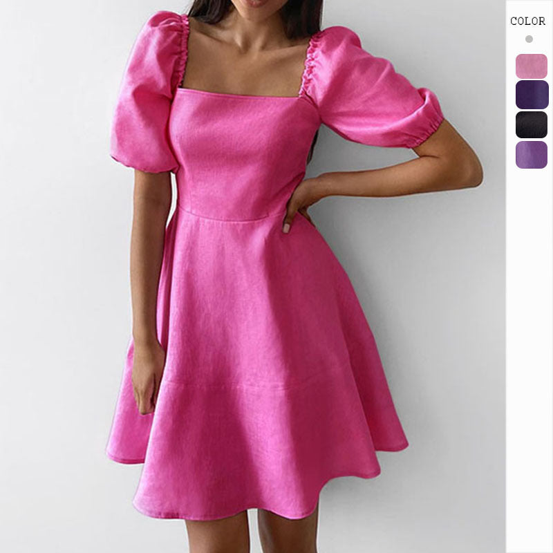 Women's Playful Dress with Generous Puff Sleeves and Swinging Hem Lune London