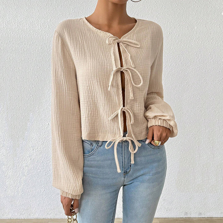 Short blouse top for women with sophisticated lace-up details Chic & Stil