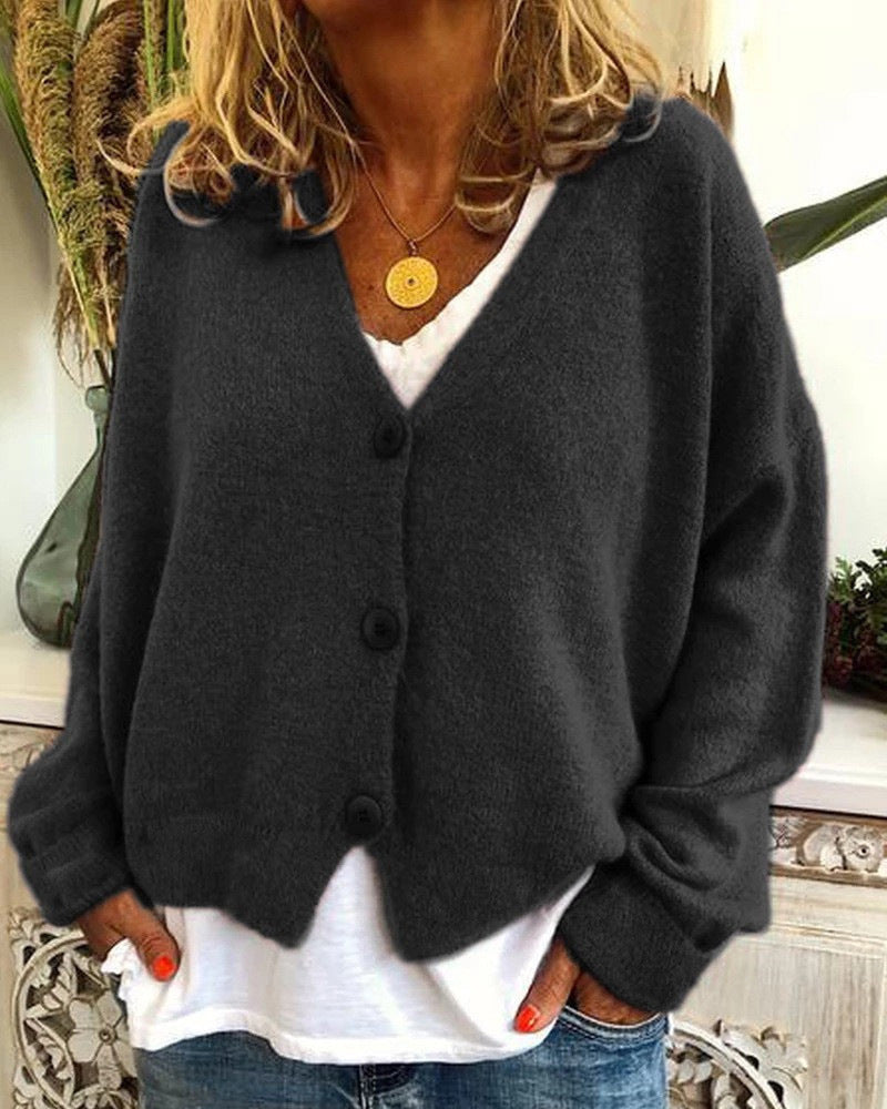 Casual knitted cardigan for women with open design and button closure Lune London