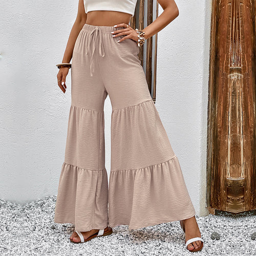 High-waisted flared palazzo pants for women with ruffled hem Lune London