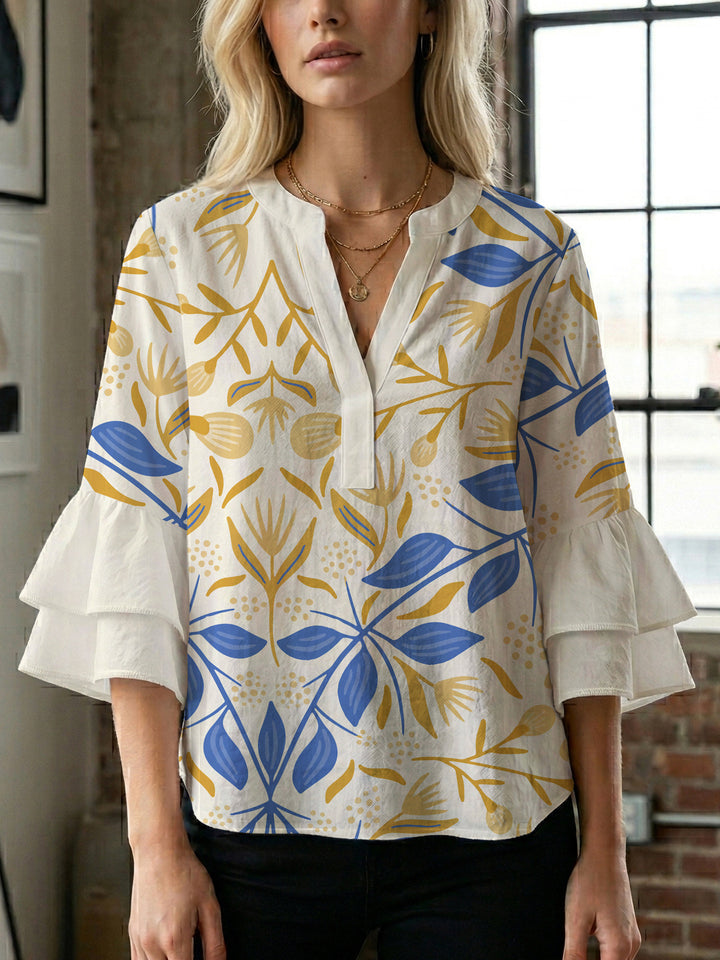 Ladies blouse with voluminous ruffled sleeves and floral print Lune London