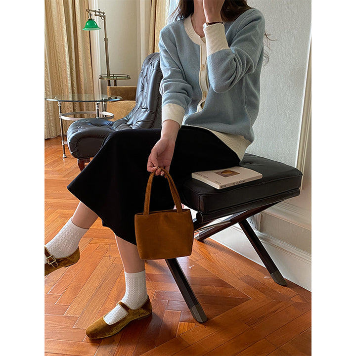 Women's cozy knitted sweater with button details Chic & Stil