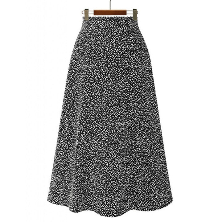 Jupe midi pour femmes avec une coupe élégante en A et un design à pois à la mode Chic & Stil