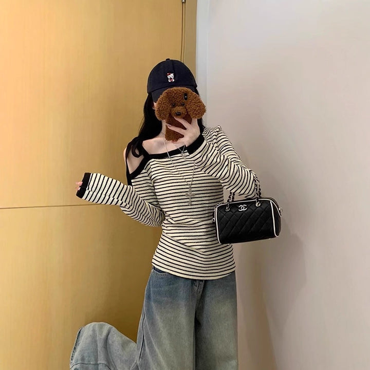 Ladies long sleeve top with off-shoulder design and fashionable stripes Chic & Stil